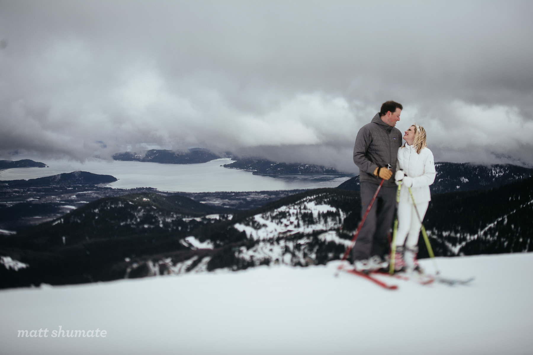 bride and groom being married on a snowy mountain